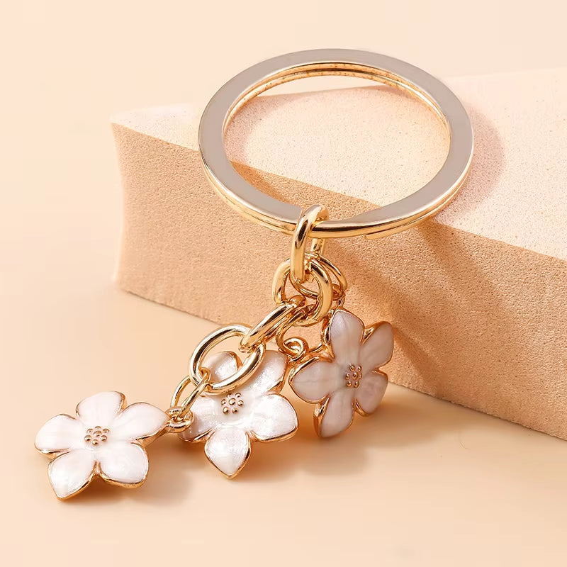 Aihua 40 Colors Cute Plant Keychain Enamel Sakura Flower Keyring for Women Girl Handbag Pendant Car Key Holder DIY Jewelry Gifts